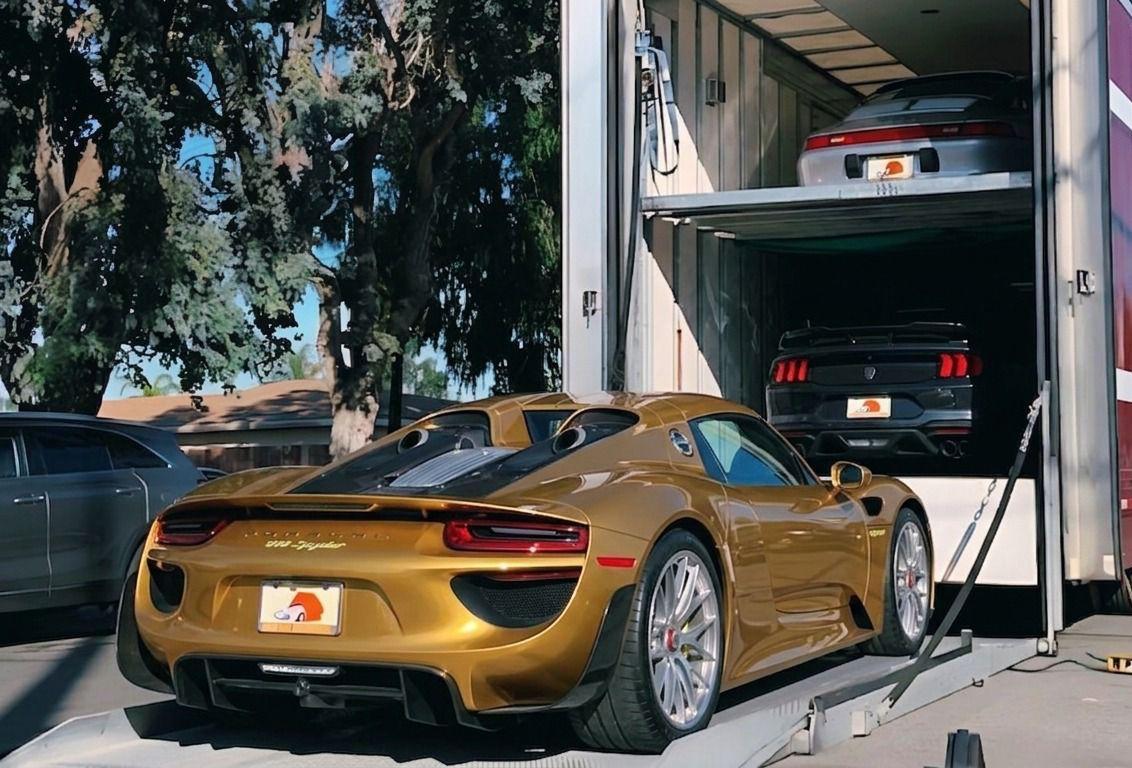 Go Auto Freight premium enclosed carrier transporting luxury vehicle